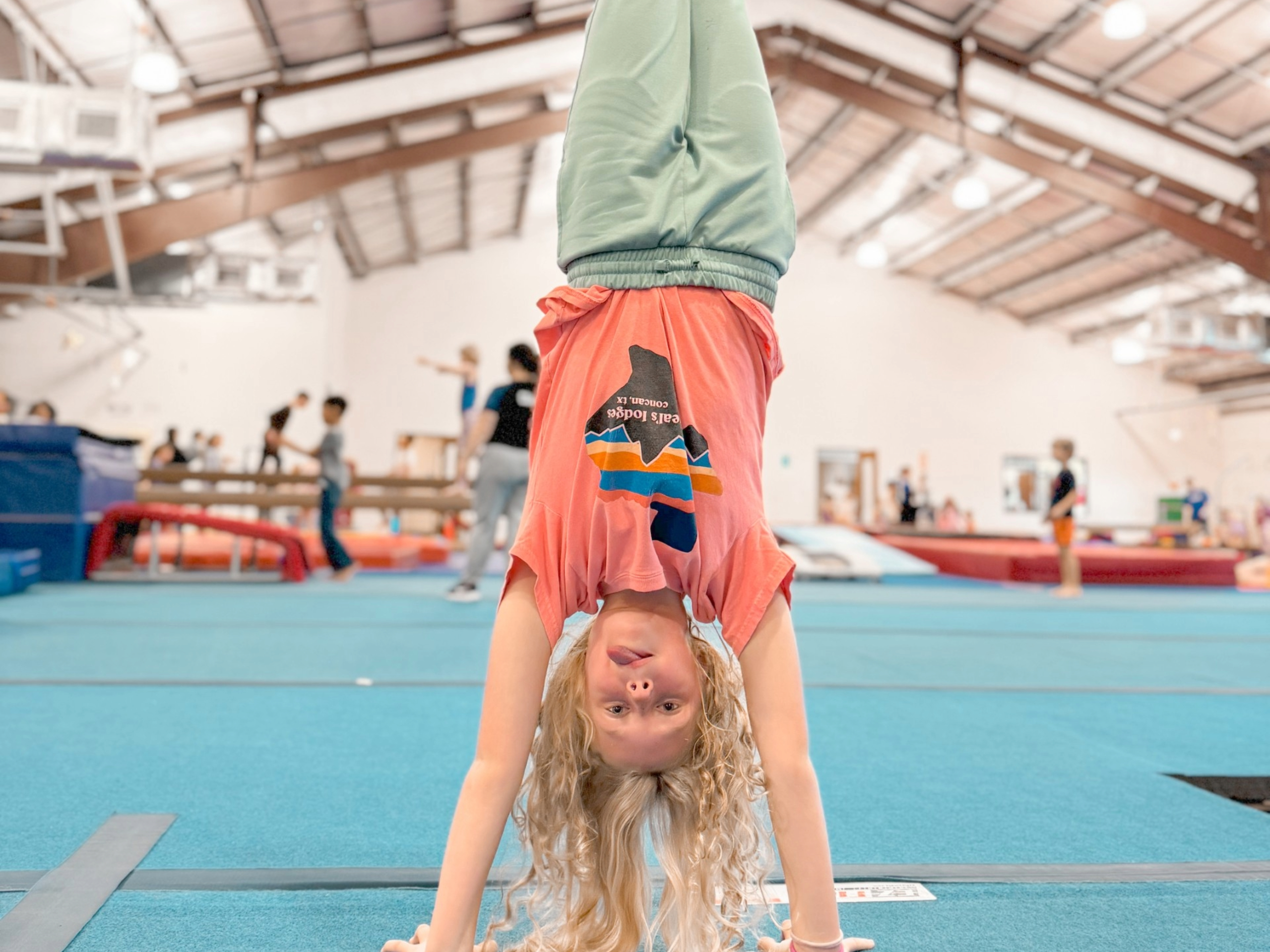 Coach with tumbling students